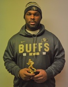 Chris Mulumba palkinnon kera.